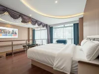 Xingyi Baximan Hotel (Xingyi Minzu Normal University) โรงแรมในซิงอี้