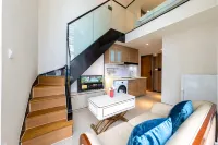 Qingxin Xiaoshe Seaview Apartment (Danzhou Haihuadao Branch)