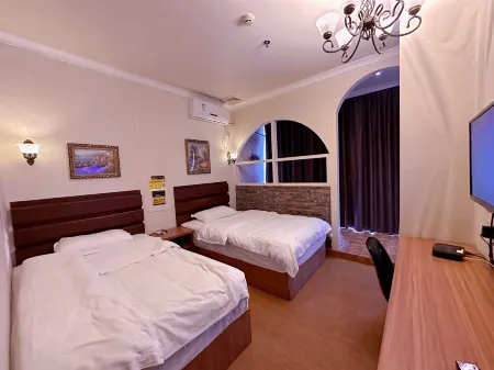 Hua Ji Hotel Отели рядом с достопримечательностью «Golden Rooster Ridge»