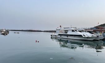 Qingdao Chujian. Yijia Preferred Hotel (Golden Beach Wuyue Plaza)