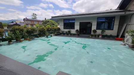 Zhangjiajie  Guiyuanju Inn Отели рядом с достопримечательностью «Tianmen Mountain National Forest Park»