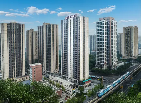Jinke Ruijing Hotel (6 kilometers light rail station) Отели рядом с достопримечательностью «Chongqing Institute of Engineering (Nanquan Campus)»