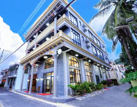 Sanya Qiwan Homestay Отели рядом с достопримечательностью «Baodao Luobei Aquarium»