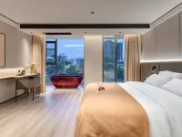 โรงแรม G จอยฟูล ชูเจียน (สวนสาธารณะม่านทิง วัดจงโฝ เชียงรุ่ง สิบสองปันนา) โรงแรมใกล้วัดป่าเชต์มหาราชฐาน
