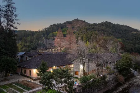 Qingyou Youju Hostel Отели рядом с достопримечательностью «Ruoliao Yuanshilin»