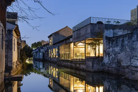 Muchen Heyin Garden Design Hotel (Shaoxing Lu Xun Hometown Cangqiao Zhijie Branch) Отели рядом с достопримечательностью «Cangqiao Street»