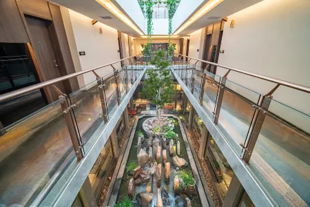 Yinluju  hotel Отели рядом с достопримечательностью «Wenfeng Garden»