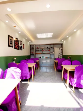 Nalatiya Xinmei Na Inn Отели рядом с достопримечательностью «Nalati Raspberry Town»