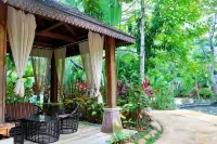 Days Inn Wyndham Xishuangbanna Jinghong Rainforest Park (Mengluo Dafosi Branch) Các khách sạn ở Cảnh Hồng