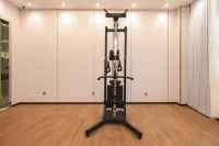 New Century International Hotel - salle de sport