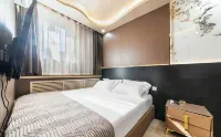 Design Guesthouse (Harbin Central Avenue Hongzhuan Street Morning Market)