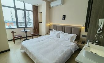 Xinda Yunshangke Hotel