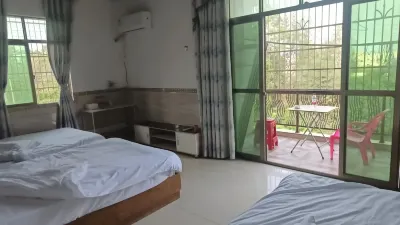 Xinggang Homestay Hoteller i Tieshangang District
