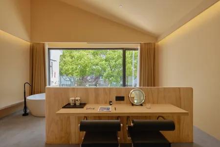 WOPAI Designer Hotel (Suzhou Guanqian Street Yangyuxiang Subway Station Branch) Отели рядом с достопримечательностью «Suzhou University of Science and Technology (Shihu Campus)»