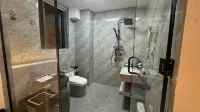 Rongjiang Xinyu Xingyuan Homestay (Village Super Football Field) - Bãi đậu xe