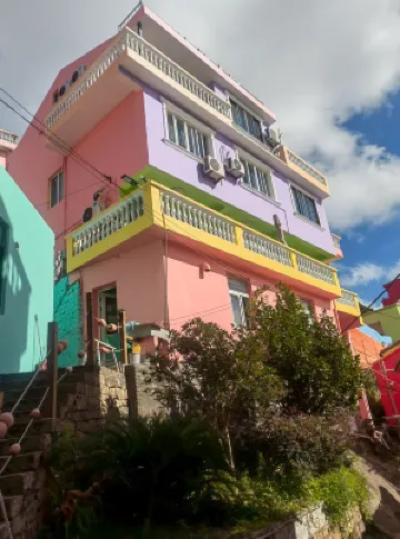 Colorful  House Hotels near Xiaoruo Village
