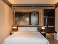 Wuzhou Sports Center Hotel Hotels near Huaxin Station