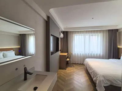 Home Inn & Hotels Ruibo Yun (Liaoyuan Station Front Bus Terminal and Ning Street Branch) のホテル