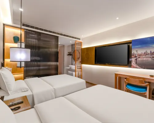 Xingnuo Hotel (Tianjin Five Avenue Yingkoudao Subway Station) Hotels near Minyuan Stadium