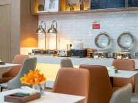 Phoenix Holiday Hotel (Xuefeng Plaza Branch), Dongkou County - petit déjeuner