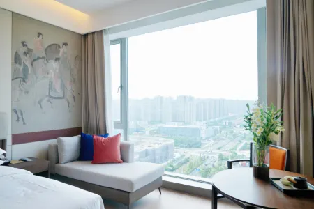 Maison New Century Hotel Hangzhou Bay (in Geely Giehow Plaza) Отели в г. Циси