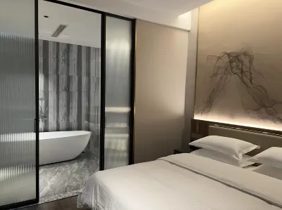 Xiangxie Yishe Hotels in People's Square&Haining Railway Station