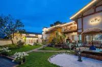 Pianyungui Boutique Homestay Отели рядом с достопримечательностью «Yunnan Vocational and Technical College of Agriculture Multi-media Classroom (Three)»