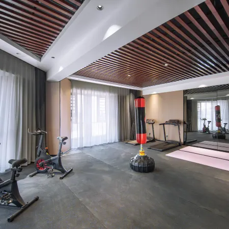 Menghai Boting Hotel (Xishuangbanna Menghai Mengbala International Resort Rainforest Avenue Branch)