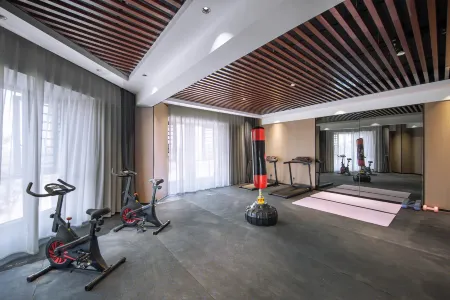 Menghai Boting Hotel (Xishuangbanna Menghai Mengbala International Resort Rainforest Avenue Branch) Отели в г. Менхай