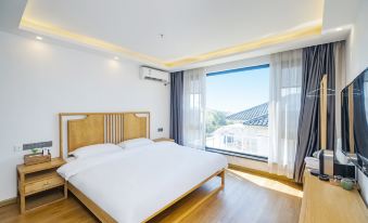 Suzhou Qixuan Homestay(taihuxishandaodian)