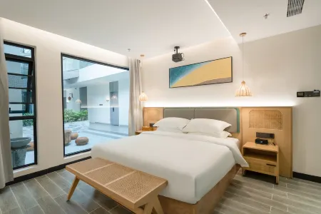 Heshe Courtyard (Guangzhou Huangpu Changzhou Island Subway Station Branch) Отели рядом с достопримечательностью «Guangdong University of Foreign Studies (South Campus)»