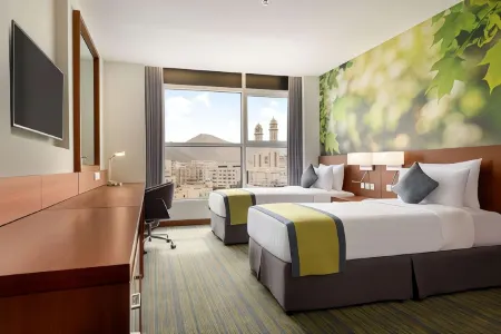 Wyndham Garden Muscat Al Khuwair Отели рядом с достопримечательностью «Qurum Beach»