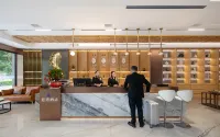 Blue Bay Hotel Hotel di Hezhang