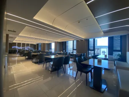 Baolifeng International Business Hotel Отели рядом с достопримечательностью «Longfeng Wetland»