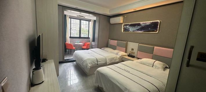 Guiding Yiyi Hotel Ξενοδοχεία στην πόλη Γκούιντινγκ