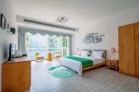 Beihai Her Small Courtyard Homestay (Qiaogang Fengqing Street International Passenger Port Branch)