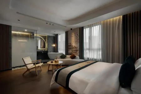 Junyong Hotel (Qijiang Wanda Plaza) Отели рядом с достопримечательностью «Chongqing Foreign Languages and Foreign Affairs College (Qijiang Campus)»