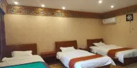 Zagunao Zangjia Theme Hotel - Accogliente Tripla Stanza