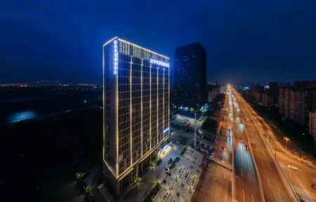 Gujing Junlai International Hotel (Feidong Wenyi Platinum Branch) Отели в г. Фэйдун