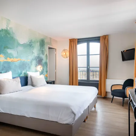 Hôtel de la Cité Отели рядом с достопримечательностью «Пляж Сийон»
