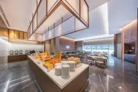 Meishan Pengshan North Station Atour Hotel