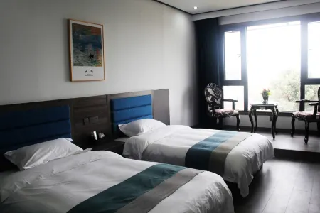 Zhouzhi Shengze Hotel Отели рядом с достопримечательностью «Qinling National Botanical Garden»