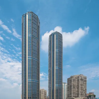 Yongyi Yuelan Holiday Hotel (Chongqing Lianglukou Subway Station Children's Hospital Branch) Отели рядом с достопримечательностью «Стадион «Датяньвань»»