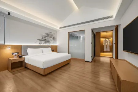 Chengdu Pidu Maison New Century Отели рядом с достопримечательностью «Sandaoyan»