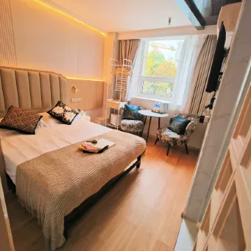 Shanghai Puyi Hotel (Yuyuan Laoximen Subway Station Branch) Отели рядом с достопримечательностью «Станция метро Laoximen»