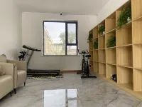 Xingzi Hotel (Maralbexi Museum) - Gym