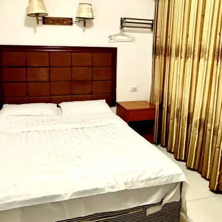 Wusheng Hexin Business Hotel