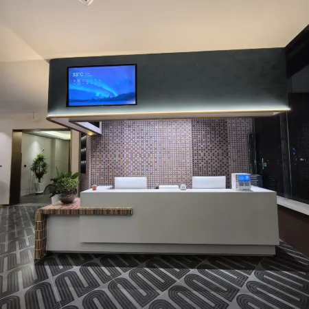 Awati Xinhua Century Hotel (Daolang Square) Отели рядом с достопримечательностью «Народная больница в Авати»