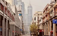 Aige Boutique Hotel (Shanghai Bund Great World Metro Station Branch) Hoteles en Zona comercial de Huaihai Road
