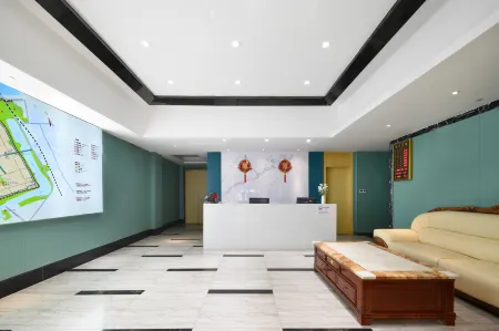 Ruining Hotel ( Xiangyang Gucheng North Street Branch) Отели рядом с достопримечательностью «Gulou Culture Square»